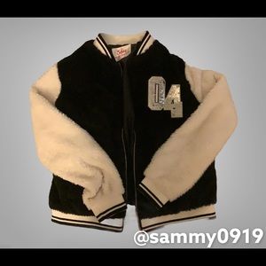 Justice black and white fluffy sequence jacket